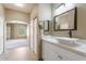 Bright bathroom features a quartz countertop, decorative sink and bronze faucet at 9600 N 96Th St # 263, Scottsdale, AZ 85258