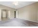 Bedroom features neutral color palette, carpet and an archway entrance at 9600 N 96Th St # 263, Scottsdale, AZ 85258