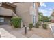 Exterior of a two-story apartment building with stairs, landscaping and unit number 17 at 9600 N 96Th St # 263, Scottsdale, AZ 85258