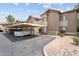 Exterior of an apartment building featuring covered parking, landscaped grounds, and unit number 17 at 9600 N 96Th St # 263, Scottsdale, AZ 85258