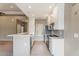 Modern kitchen featuring white cabinets, stainless steel appliances, and a sleek backsplash for a contemporary feel at 9600 N 96Th St # 263, Scottsdale, AZ 85258