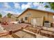 Spacious backyard featuring a garden area, patio with seating, and a storage shed for outdoor convenience at 10226 W Country Club Trl, Peoria, AZ 85383