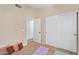 Cozy bedroom featuring a closet with sliding doors and a neutral carpet at 10226 W Country Club Trl, Peoria, AZ 85383