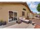 Inviting outdoor patio features comfortable seating and stylish decor, perfect for relaxing and entertaining at 10226 W Country Club Trl, Peoria, AZ 85383