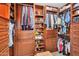 Large walk-in closet with custom shelving and organized storage at 10226 W Country Club Trl, Peoria, AZ 85383