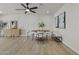 Elegant dining area with modern decor, stylish seating, and plenty of natural light for gatherings at 10612 N 48Th Ave, Glendale, AZ 85304