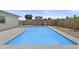 Cool blue pool with modern design and spacious concrete surround in backyard at 10612 N 48Th Ave, Glendale, AZ 85304
