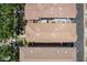 Rooftop aerial view showcases a house with a clay tile roof and a tidy backyard patio at 1086 S Nancy Ln, Gilbert, AZ 85296