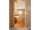 Bathroom features an oversized soaking tub, tile floors and a view of the vanity area at 1086 S Nancy Ln, Gilbert, AZ 85296
