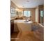 Bathroom features an oversized soaking tub, tile floors, a window and a glass enclosed shower at 1086 S Nancy Ln, Gilbert, AZ 85296