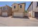 Two-story home with a two-car garage showcasing a tidy front exterior in a residential neighborhood at 1086 S Nancy Ln, Gilbert, AZ 85296