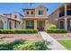 Charming two-story home with a tile roof, covered porch, and well-manicured landscaping at 1086 S Nancy Ln, Gilbert, AZ 85296