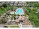 Aerial view of a community pool featuring lounge areas, grilling stations, and cabanas, perfect for Gathering gatherings at 1086 S Nancy Ln, Gilbert, AZ 85296