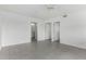 Spacious bedroom with sleek tiled flooring and access to a bathroom, providing a private retreat at 1111 W University Dr # 3016, Tempe, AZ 85281