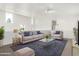 Upstairs living room boasting lots of natural light, plush area rug and comfortable seating arrangement at 1111 W University Dr # 3016, Tempe, AZ 85281