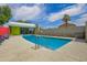 Modern community pool with lush landscaping and nearby exercise center, providing a refreshing outdoor amenity at 1111 W University Dr # 3016, Tempe, AZ 85281