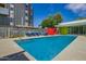 Community pool with lounge chairs and landscaped surroundings, creating a relaxing oasis for residents to enjoy at 1111 W University Dr # 3016, Tempe, AZ 85281