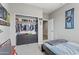 Comfortable bedroom features a closet with built-ins, offering ample storage at 12105 W Wier Ave, Avondale, AZ 85323