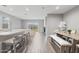 Open living and dining area with modern decor and plenty of natural light at 12105 W Wier Ave, Avondale, AZ 85323