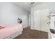 Bright bedroom featuring storage under the bed, closet and an inviting, tranquil atmosphere at 12834 W Forest Pleasant Pl, Peoria, AZ 85383