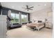 Spacious main bedroom with carpet, natural light, and ample room for a treadmill at 12834 W Forest Pleasant Pl, Peoria, AZ 85383