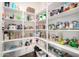 Walk-in pantry with organized shelving, ample storage, and easy access to kitchen essentials at 12834 W Forest Pleasant Pl, Peoria, AZ 85383