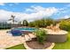 Stunning backyard pool with lush landscaping provides a private and serene retreat at 12834 W Forest Pleasant Pl, Peoria, AZ 85383