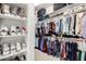 Large walk-in closet with an ample amount of storage space including shelving and hanging racks at 12834 W Forest Pleasant Pl, Peoria, AZ 85383