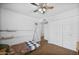 Inviting bedroom featuring a ceiling fan, double closet doors, and comfortable neutral decor at 1408 N 62Nd Pl, Mesa, AZ 85205