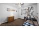 Comfortable bedroom with window views, warm wood accents, and ample space to relax at 1408 N 62Nd Pl, Mesa, AZ 85205