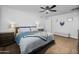 Large bedroom featuring a ceiling fan, neutral walls and plush carpeting at 1408 N 62Nd Pl, Mesa, AZ 85205