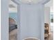 View of a bedroom with blue accent wall through archway at 16139 N 171St Ln, Surprise, AZ 85388