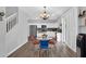 Charming dining area with retro furniture, open to a modern kitchen with stainless steel appliances at 16139 N 171St Ln, Surprise, AZ 85388