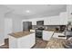 This kitchen features granite countertops, stainless steel appliances, and a functional kitchen island at 16139 N 171St Ln, Surprise, AZ 85388