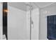 Detail of a shower with glass doors and silver fixtures at 16139 N 171St Ln, Surprise, AZ 85388