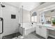 Elegant bathroom offering a glass-enclosed shower, soaking tub, and stylish vanity at 16424 S 46Th Way, Phoenix, AZ 85048