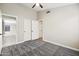Inviting bedroom showcasing a ceiling fan, ample closet space, and soft carpeting at 16424 S 46Th Way, Phoenix, AZ 85048