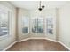 Cozy dining nook with three windows, offering abundant natural light and tile flooring, perfect for enjoying meals at 16424 S 46Th Way, Phoenix, AZ 85048