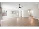 Expansive living room with tile floors, neutral walls, ceiling fan and bright, natural light at 16424 S 46Th Way, Phoenix, AZ 85048