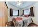 Cozy bedroom featuring a double window for natural light at 17200 W Bell Rd # 1015, Surprise, AZ 85374