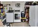 Utility area in the garage with washer and dryer at 17200 W Bell Rd # 1015, Surprise, AZ 85374