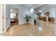 Bright, open living room and kitchen, with the bedroom to the left at 17200 W Bell Rd # 1015, Surprise, AZ 85374