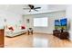 Cozy living room featuring a sleek couch and a large window at 17200 W Bell Rd # 1015, Surprise, AZ 85374