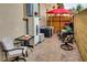Outdoor patio area with tables and chairs at 17200 W Bell Rd # 1015, Surprise, AZ 85374