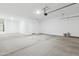 Large garage with extra storage space and epoxy floor, perfect for hobbies or parking two cars at 18795 E Bruno Dr, Gold Canyon, AZ 85118