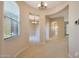 Bright dining area with arched entryways and a decorative chandelier at 20750 N 87Th St # 2062, Scottsdale, AZ 85255