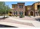Charming two-story home with desert landscaping and a stone facade at 20750 N 87Th St # 2062, Scottsdale, AZ 85255