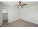 Bedroom with carpet and ceiling fan at 22074 W Papago St, Buckeye, AZ 85326