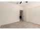 Bedroom with ensuite bathroom and closets at 24627 W Ripple Rd, Buckeye, AZ 85326