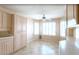 Cozy breakfast nook with large windows, tile flooring, a ceiling fan, and lots of natural light at 24907 S Lakestar Dr, Sun Lakes, AZ 85248